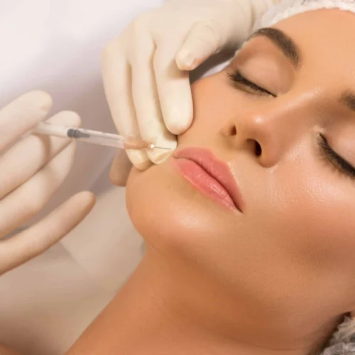 Woman getting injected with lip filler | Skin N Tox Aesthetics | Meridian, ID