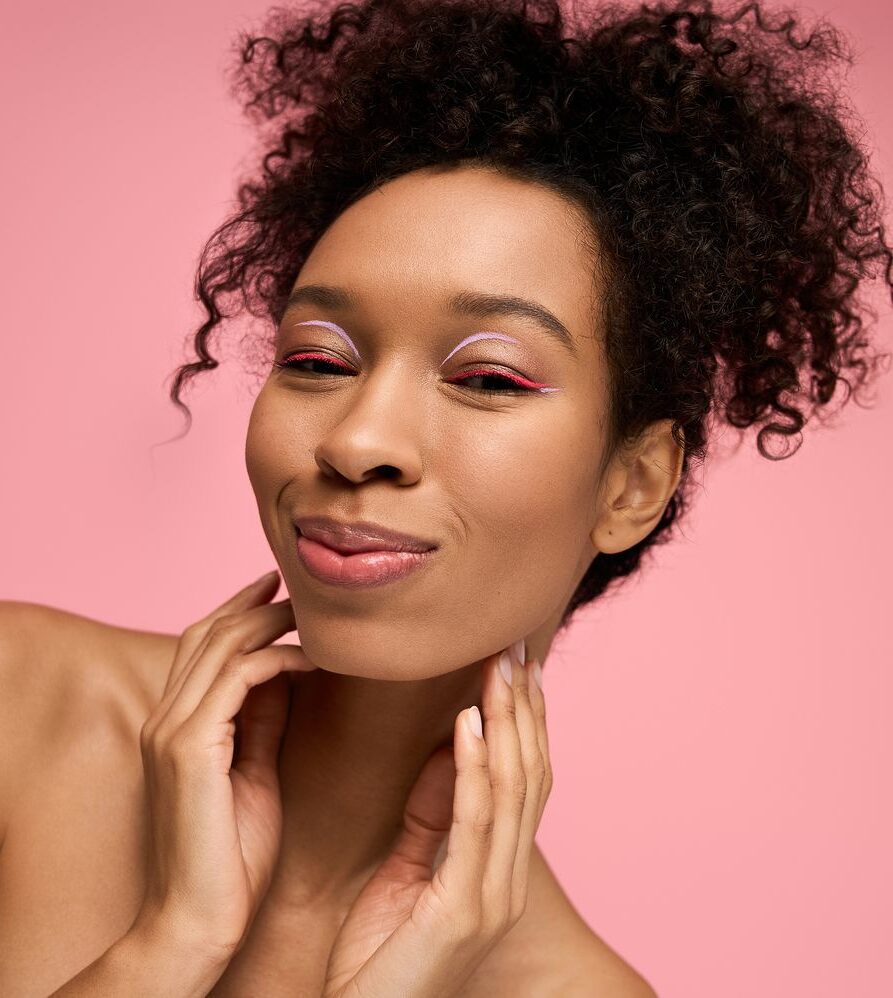Radiant woman with clear glowing skin after IPL photofacial treatments