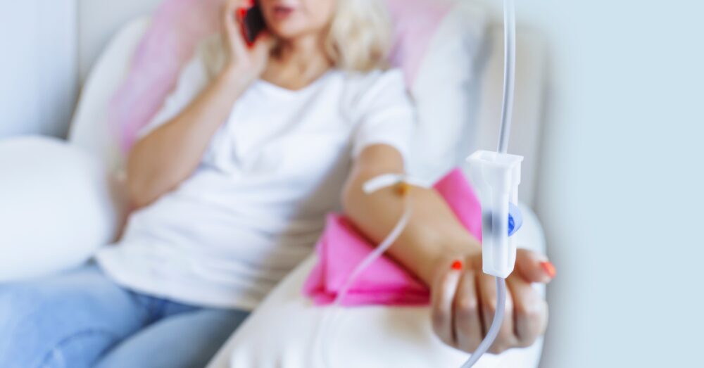 A woman receiving IV therapy